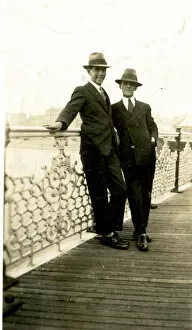 Relaxed Gallery: Two men on Brighton Pier, Brighton, East Sussex