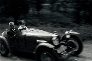 Images Dated 9th June 2016: Two men in a Bugatti sports car
