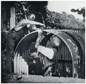 Phony Prints: Two men building an Anderson shelter, September 1939