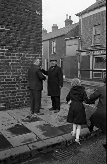 Falls Gallery: Two men chatting, Falls Road, Belfast, Northern Ireland