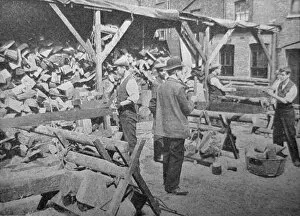 Images Dated 26th June 2012: Men Cutting Wood at a Church Army Relief Depot