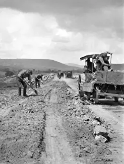 Surfacing Prints: Men engaged in roadworks