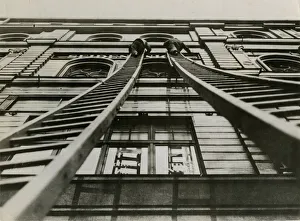 Angle Gallery: TWO MEN UP LADDERS