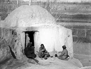 Xinjiang Prints: Three men outside a dwelling, Kashgar, western China