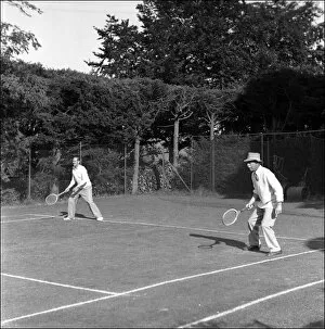 Men playing tennis at Crosslands House