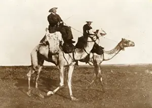 Barren Prints: Two men riding camels