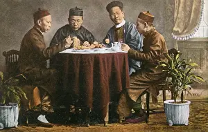 Chow Prints: Four men share a meal, China