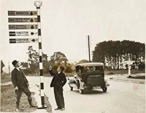 Sign Posts Collection: Men and signpost