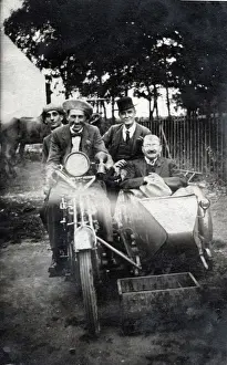 Suits Prints: Four men sitting on vintage motorcycle and in sidecar