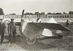 Men Standing and Pilot Sitting in the Cockpit of an Airc?