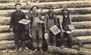 Shabby Gallery: Four men with trowels and cement on boards, USA