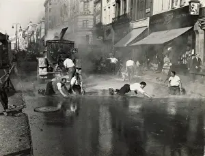 Shirts Prints: Men in white shirts asphalting The Strand, London, outside Boots the Chemists