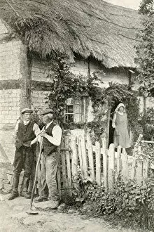 Calm Gallery: Men and woman outside a thatched cottage, Herefordshire