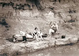 Pic Nic Prints: Two men and a woman picnicking in bathing suits