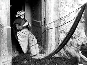 Nets Collection: Mending fishing nets early 1900s