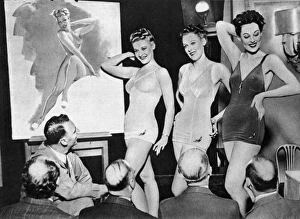 Images Dated 10th January 2012: Merlin Enabnit and pin up girls