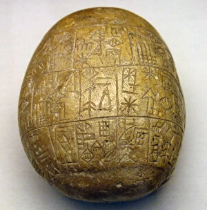 Pebble Gallery: Mesopotamia. Early Dynastic Period III. Votive pebble with i