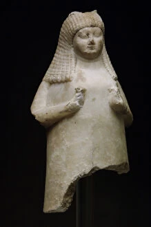 Mesopotamian Art. Alabaster flower vase shaped as a woman ho