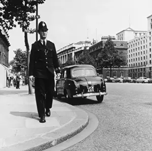 Kerb Prints: Met Police officer on a street corner