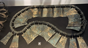 Goldsmith Gallery: Metal Age. Belt of many small bronze rings and ornamental pl