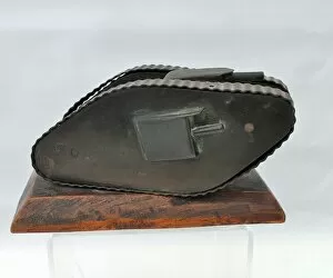 Images Dated 14th February 2012: Metal model of WW1 tank on wooden base