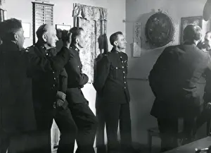 Metropolitan Police B Division officers playing darts
