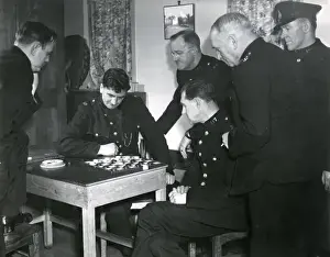 Metropolitan Police B Division officers playing draughts