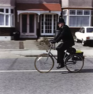 Images Dated 4th February 2011: Metropolitan Police officer on his bicycle