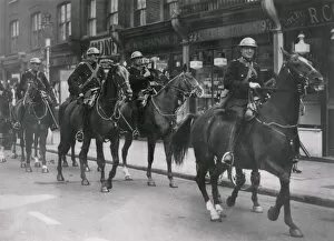 Images Dated 19th January 2011: Metropolitan Police officers on horseback, wartime London