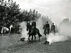 Images Dated 19th January 2011: Metropolitan Police officers on horseback in a field