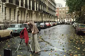 Metropolitan Police photographer at work