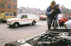 Incident Prints: Metropolitan Police photographer at work