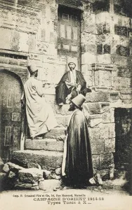 Madarsa Gallery: Three Mevlevi Dervishes outside ancient buildings