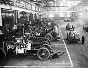 MG Midget chassis assembly and being driven, 1932