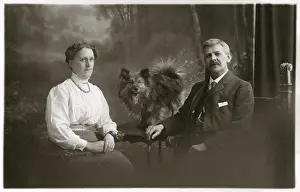 Middle aged couple with dog