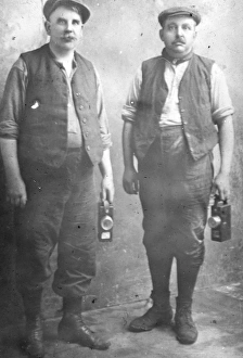 Coal Mining Collection: Two middle aged miners with their lamps, South Wales