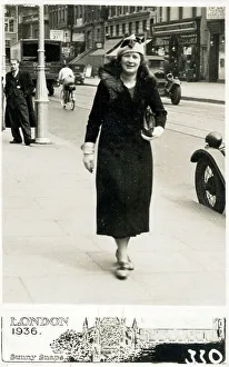 Candid Prints: Middle aged woman in long fur-trimmed coat in Lewisham