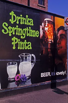 Adjacent Gallery: Milk and beer advertisements compete