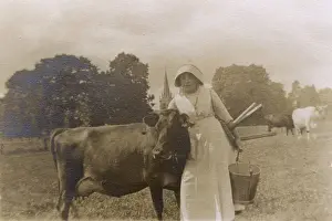 Milkmaid and cow, Madresfield, Worcestershire, WW1