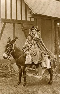 Images Dated 28th August 2018: Milkmaid on a donkey, Normandy, Northern France