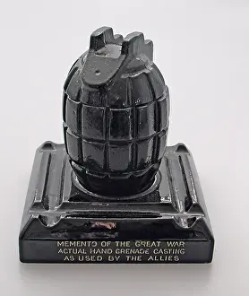 A Mills hand grenade made as an ink stand