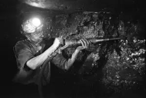 Miner Using Drill / 1956