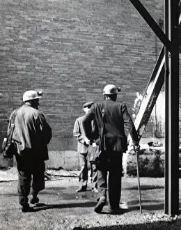 Miners with colliery official, South Wales