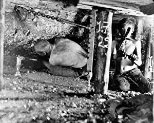 Colliery Collection: Two miners in a narrow coal seam, South Wales