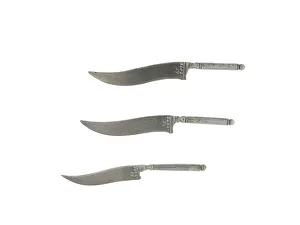 Images Dated 13th November 2014: One of three miniature metal Sikh kirpan daggers