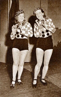 Miss Kristin Gudmundsdottir and Miss Svava Jons tap-dancing