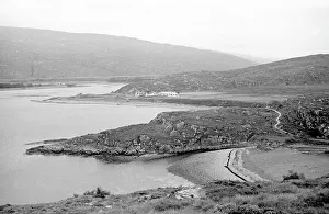 Beaches Collection: Misty hills and beaches on a sea loch