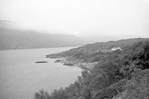 Lochs Prints: Misty hills over a mountain loch