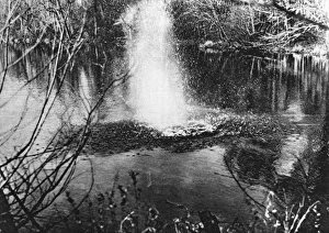 Images Dated 25th November 2011: Mitchell Hedges tests a sub machine gun, 1921
