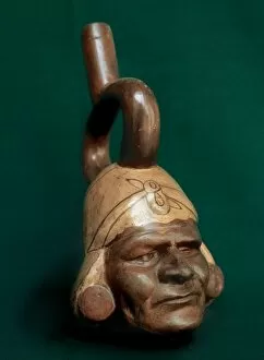 Pre Columbian Collection: Moche portrait stirrup spout vessel